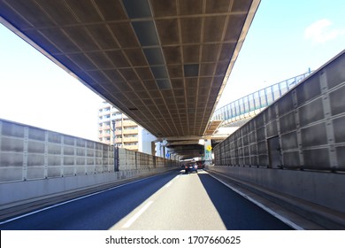 Traffic On Tokyo Metropolitan Expressway : The Meaning Japanese : After Merging To The Right Two Lanes