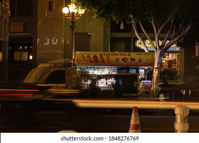 Traffic Passes A Food Truck On A Busy Street In Downtown Los Angeles, California On February 13th, 2020.