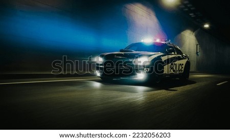 Traffic Patrol Car In Pursuit, Driving Fast with Sirens Blazing through the City Streets. Officers of the Law Chasing a Suspect. Cops in Squad Car React to Emergency Call. Cinematic Night Shot