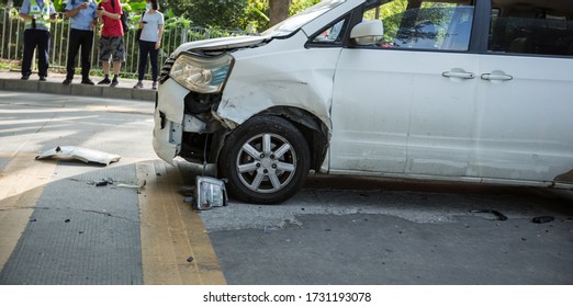 Traffic Police And Driver Handling An Car Accident On Roadside