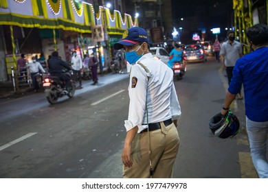 Traffic Police With Mask On Near Dagadusheth Ganapati, Pune, India. Date: 22-Aug-2020