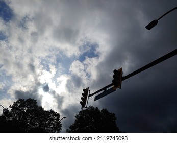 Traffic Sigh And The Amazing Sky With Clouds Trees