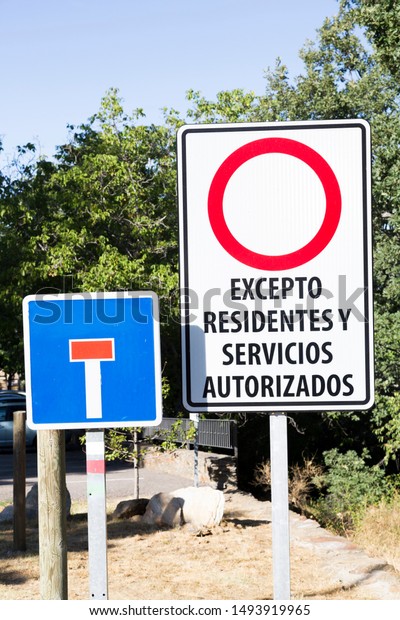 Traffic sign: attention,\
access prohibited except residents and urban services and dead end.\
Spain.