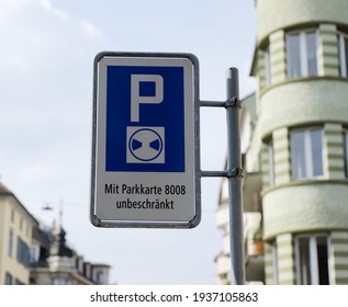 traffic sign, german text translation: blue zone, parking only allowed with parking disc, with parking card 8008 unlimited parking allowed
