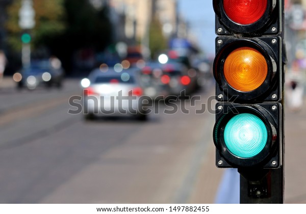 Traffic sign. Green traffic\
light.