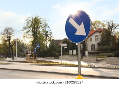 Traffic sign Keep Right on city street, space for text