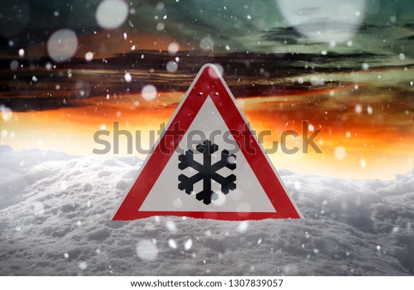 traffic sign -\
snowfall - red warning\
sign