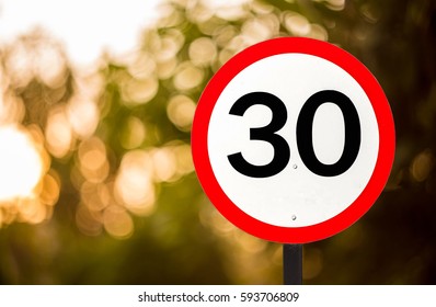 Traffic sign speed limit 30 mph. - Shutterstock ID 593706809