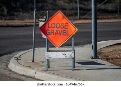 A Traffic Sign Stating  Loose Gravel 