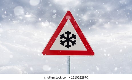 traffic sign warns of snow and ice