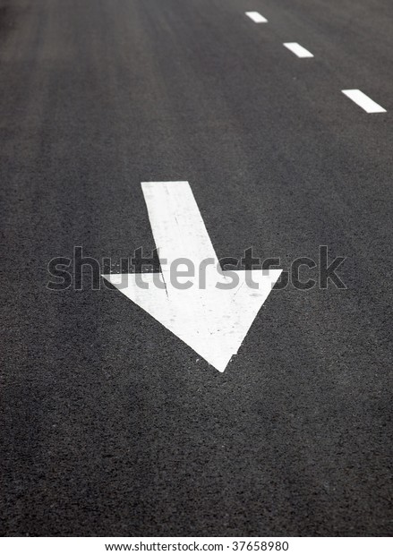Traffic Signal,go straight  signs arrows on\
asphalted surface