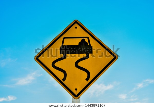 Traffic signs. Be\
careful of slippery roads, Traffic signs. Be careful of slippery\
roads from Thailand\
country