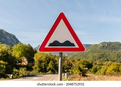 A Traffic signs, bumpy road. Road sign with a warning of a bumpy road. 
