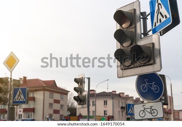 traffic signs and traffic light in the city at\
the crossroads