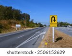 Traffic signs, U-turn points on a road in Thailand