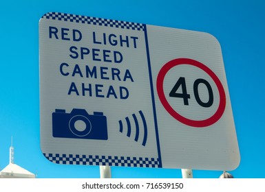 Traffic Signs Warning For Speed Limits 40 Km/h And Red Light Speed Camera Ahead.