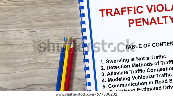 Traffic violation and penalty concept- with\
topics on a cover sheet of a\
lecture