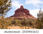 Trail Bell Rock Pathway in Coconino National Forest, Arizona. Rocky and Rough Hill, Mountain. Travel Destination. Sedona, USA Horizontal Plane Sunny Red Mountains with Trees and Sandy Path. Nobody.