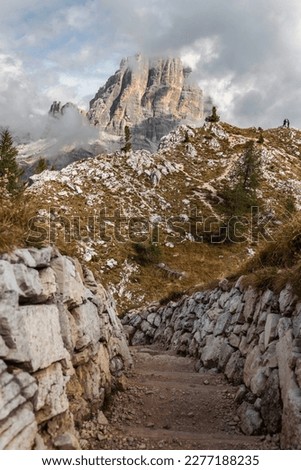 Trail at Cinque Torri leading through trenches from the First World War. Spectacular view of Tofana di Rozes mountain.
WW 1 Open Air Museum at 5 Torri, Dolomiti Ampezzane, Veneto, Dolomites, Italy.