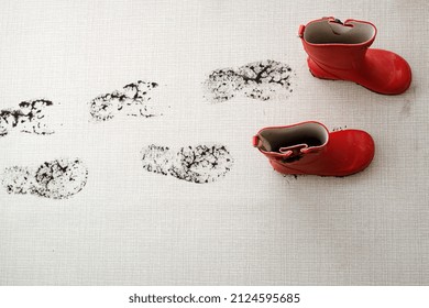 Trail of muddy footprints on carpet. daily life dirty stain for wash and clean concept. High quality photo