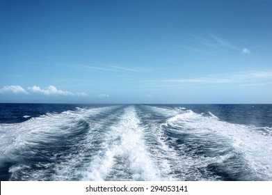 Trail On Water Surface Behind Of Fast Moving Motor Boat