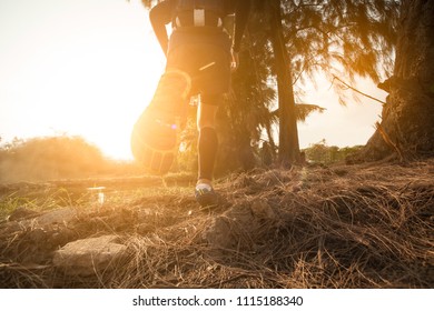 Trail running at the sunset - Shutterstock ID 1115188340