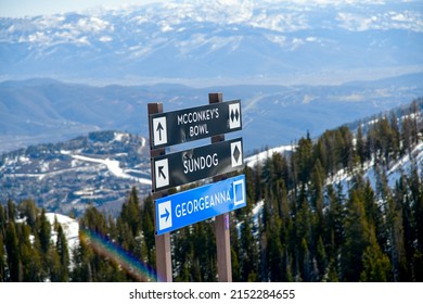 Trail Sign At Park City Ski Area, Utah. Top View To The Valley With Montains Range During Early Spring Weather Conditions. 