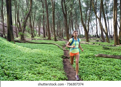 Trail Ultra Running Sport Runner Athlete Woman Sprinting In Forest Green Grass. Sport Sprinter Active Doing Intense Cardio Training Outdoors In Summer Landscape.