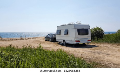trailer caravan car by the sea, holidays in the nature outdoor by the sea in the summer