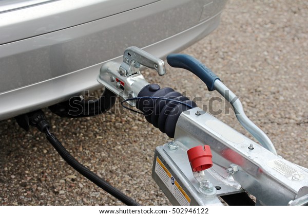 Trailer hitch with trailer on\
a car