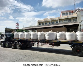 Trailer Loading Sack Goods To Customers.