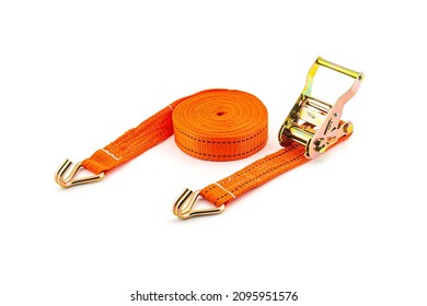 Trailer strop or strap in orange nylon and metal tie isolated over white background. Ratchet straps for cargo load control. Cargo restraint strap