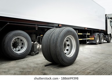 Trailer Truck Maintenace And Repairing. Truck Spare Wheels Tyre Waiting For To Change.