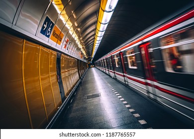 Train arriving at the platform. Perspective. Selective colour.
Translation of station name - National Street.
