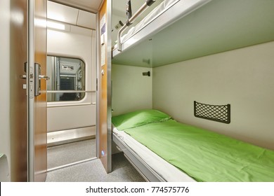 Train berth corridor indoor with two beds. Travel background. Horizontal - Shutterstock ID 774575776