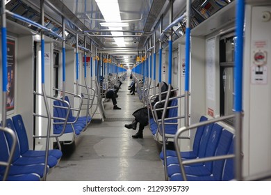 A train car in the subway, there are few passengers in the car because of the coronavirus