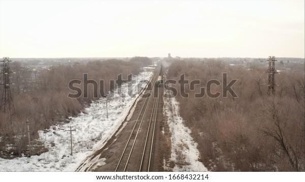 The train carries freight\
cars. Rail freight cars carrying coal. Railway train travels by\
rail