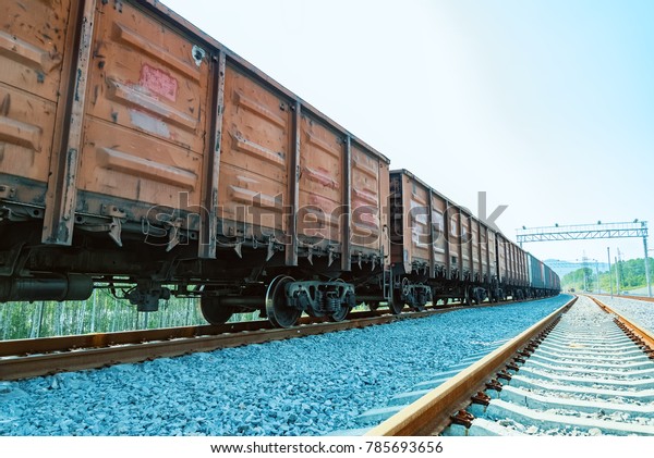 Train cars are on the\
rails