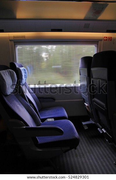 In\
the train compartment of an express train in\
Germany