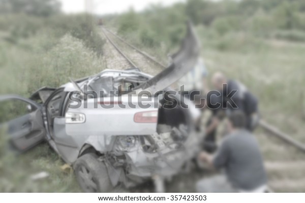 Train crashes in car\
blurred