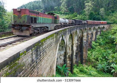 Train crosses Demodara nine arch bridge. Sri Lanka