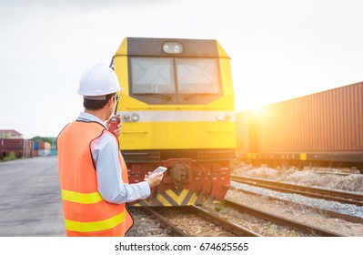 Train Engineer Working At Freight Train Station