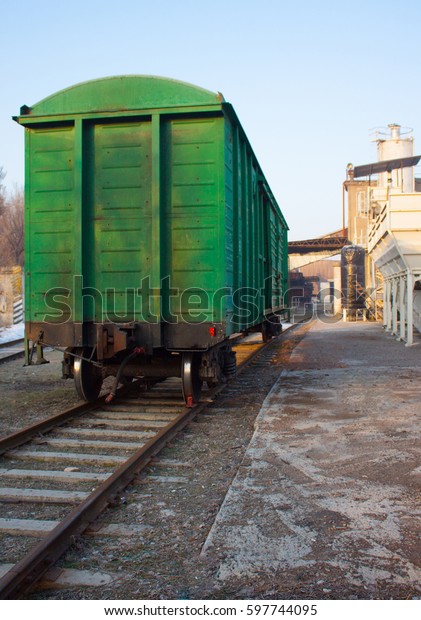 Train freight car\
green color on the rails