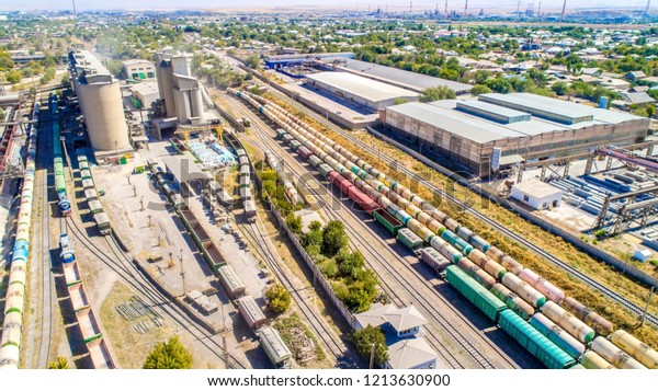 Train freight cars.\
Railway composition, export and import goods, pebbles of trucks\
with cement, with transportation of railways with fuel and coal\
cars from the factory