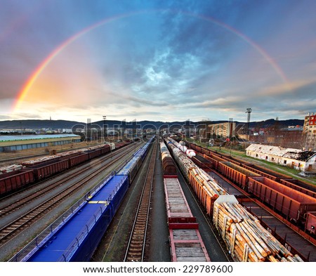 Train Freight transportation with rainbow - Cargo transit