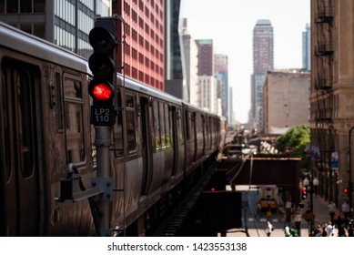 train going by the stoplight