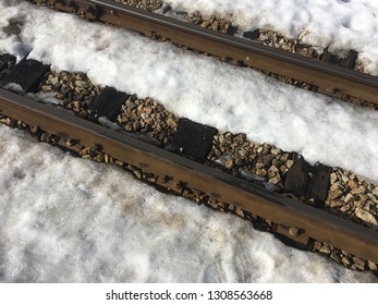 Train going with snow
