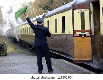 train guard signaling for train to depart