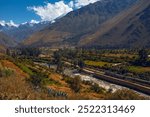 Train heading through the Andes in Peru with stunning landscape, Ollantaytambo is the last stop to get train to Machu Picchu at Peru