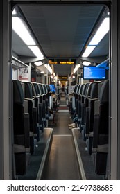Train inside, empty seats on the train.